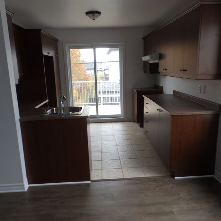 Logement 4 1/2 1 E étage Style Condo - Photo 1