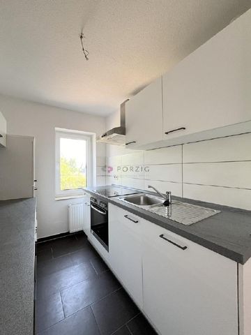 Wunderschöne DG-Wohnung mit Einbauküche und Balkon - Foto 5