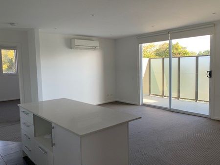SUN DRENCHED 2 BEDROOM BEAUTY IN HOT SPOT! - Photo 2