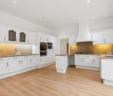 An impressive home complete with large garden and detached garage l... - Photo 1