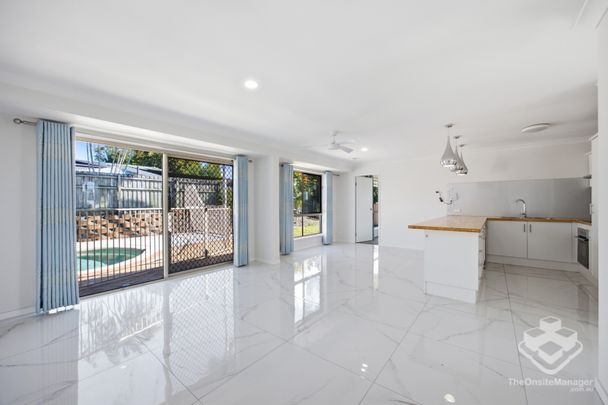 Stylish Family Living with Pool in Prime Parkwood Location - Photo 1