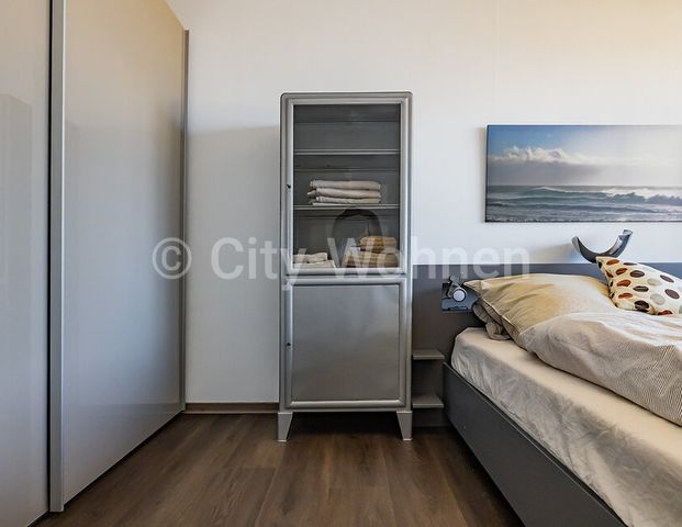 Möblierte 2-Zimmer Wohnung über den Dächern der Stadt im Mundsburg Tower in Hamburg-Barmek Süd - Photo 1