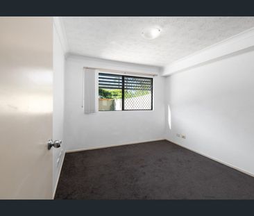 Charming Two-Bedroom Unit with Generous Private Courtyard in Secure... - Photo 2