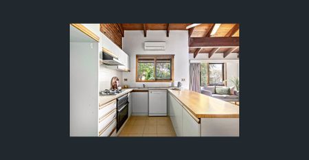 Stylish two-bedroom villa with mezzanine living - Photo 2