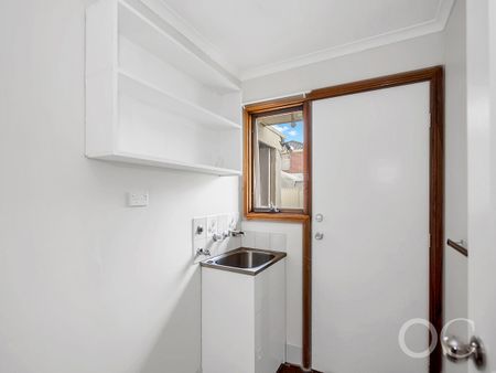 Open the Door to Comfortable Family Living in a Spacious Burton Home - Photo 3