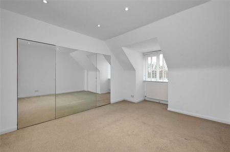 A beautifully presented four bedroom terraced home offering generous accommodation arranged over three floors, ideally located in the heart of Send, within easy reach of Woking and Guildford - Photo 4