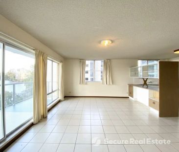 “SPACIOUS 2 BEDROOM UNIT WITH STUNNING RIVER AND CITY VIEWS” - Photo 4
