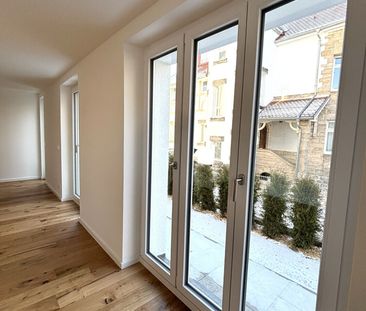 Helle 3-Zimmer-Neubauwohnung mit Terrasse, moderner Einbauküche & P... - Foto 3