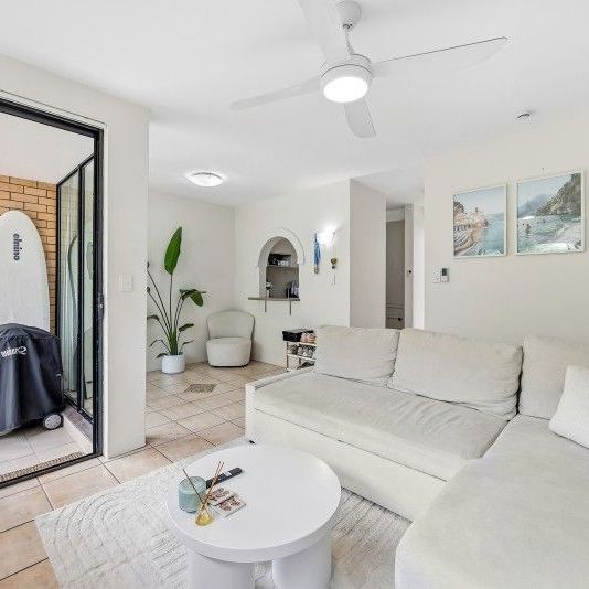 Convenient location & Coastal Breezes - Beachside Living at Its Best! - Photo 1