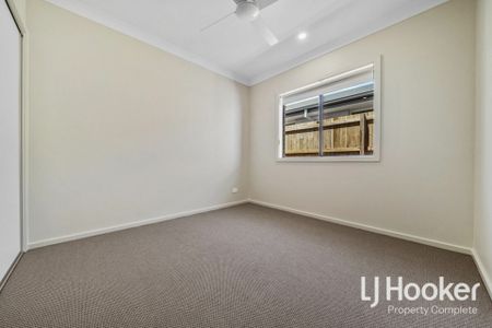 Modern Family Home with Ducted Air Conditioning & Media Room - Photo 4