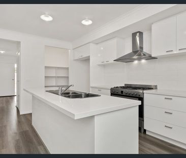 Near-New 4-Bedroom Family Home in a Prime Location! - Photo 5