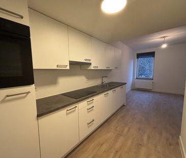 Appartement met een opp. van 100m² gelegen in centrum Kermt - Photo 1