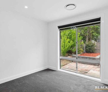 Stylishly Renovated Home with Sunroom Retreat - Photo 4