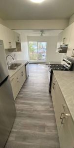 2 bedroom TOP FLOOR fully renovated suite!! Early move-in possible! - Photo 4