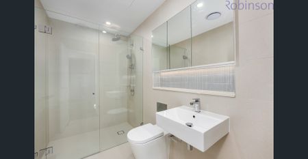 Modern split-level apartment with luxe finishes in a prime location. - Photo 4