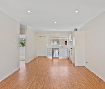 Stylish & Secure 2-Bedroom, 2-Bathroom Apartment - Photo 2