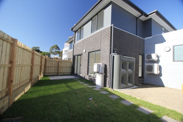 MODERN 3 BEDROOM TOWNHOUSE WITH DOUBLE GARAGE - Photo 1