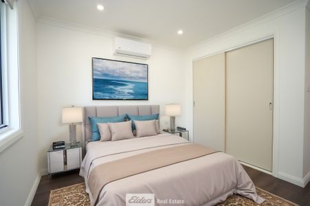Convenient 2-Bedroom Unit with Low Maintenance - Photo 3