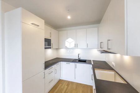 Hochmoderne 2-Zimmer Wohnung mit Einbauküche ~ Hausinternes Fitnesscenter - Photo 2