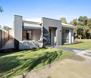 Modern, Low-Maintenance Living in a Peaceful Natural Setting - Photo 1