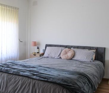 Charming Family Home with Expansive Outdoor Living in Prime Location - Photo 5