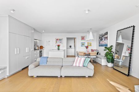 Architecturally Re-Designed Apartment with Northern Harbour Views - Photo 4