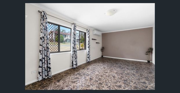 Spacious Family Home with Pool in Prime Browns Plains Location - Photo 1