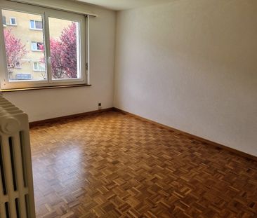 Appartement de 3 pièces au 1er étage avec part au grand jardin commun - Photo 3