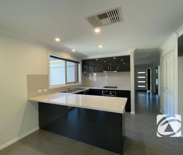 FAMILY HOME IN IN THE COLLEGE GREEN ESTATE! - Photo 5