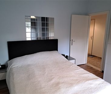 Een appartement op de eerste verdieping met garage en tuintje - Photo 6