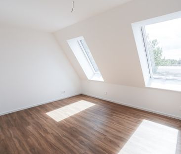 Dachgeschosswohnung mit großzügiger Terrasse - 3 Zimmer auf über 90... - Photo 2