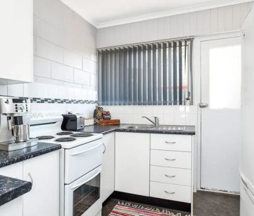Coastal Convenience Meets Low-Maintenance Living - Photo 3