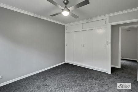 A beautifully renovated four-bedroom home - Photo 2