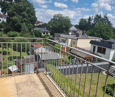 Gemütliche Dachgeschosswohnung mit Balkon und Blick in den Park! - Foto 2