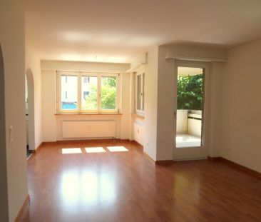 Helle 4.5-Zimmerwohnung mit Cheminée und grosszügigem Gartensitzplatz - Foto 1
