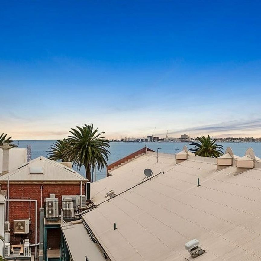 Stunning Split-Level Warehouse Conversion with Bay Views & Luxe Space - Photo 1