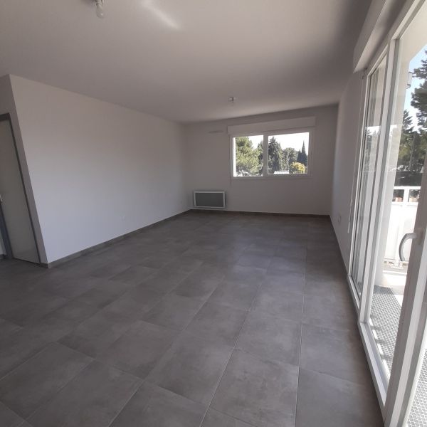 Location Appartement 3 pièces 59m² NIMES 30000 - Photo 1