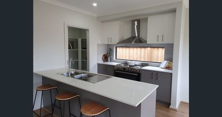 Stunning Finishes and Flexible Spaces Await - Photo 5