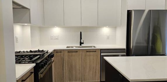 **Larger Condo Unit with added features - Brand New** - Photo 2