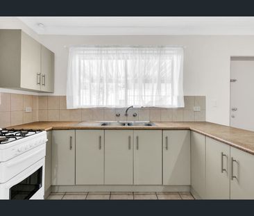 Easy-Care Unit! - Photo 3