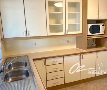 Spacious 3-Bedroom, 2-Story Retreat with Creek Views - Photo 4