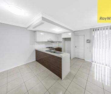 Spacious Tri-Level Townhouse - Light-Filled and Conveniently Located - Photo 6