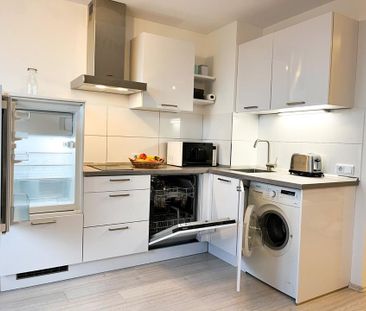 Modernes City-Apartment mit Skyline- und Parkblick - Foto 1