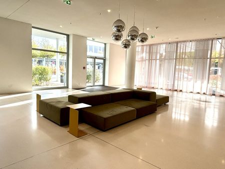 U-Bahn U1 Kagran I Stylische Wohnung mit exklusiver Ausstattung und Loggia I Rooftop Pool I Fitnessraum I Spa-Bereich - Photo 3