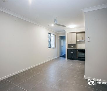 QUIET AND PEACEFUL LIVING IN LOGAN RESERVE - Photo 1