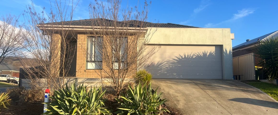 Comfortable Family Living in White Box Rise - Photo 1