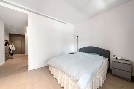 The studio apartment itself boasts an open-plan layout, providing a seamless flow between the living, dining, and sleeping areas. - Photo 4