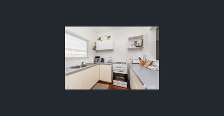 Cute Cottage Style Home in Sought After Location - Photo 4