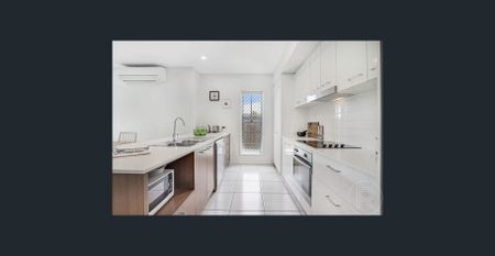 Modern Four Bedroom Home in Bells Reach Estate - Photo 5