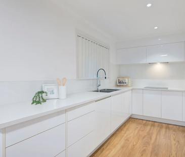 Light-Filled Family Home with Entertainer's Deck & Parkside Position! - Photo 1